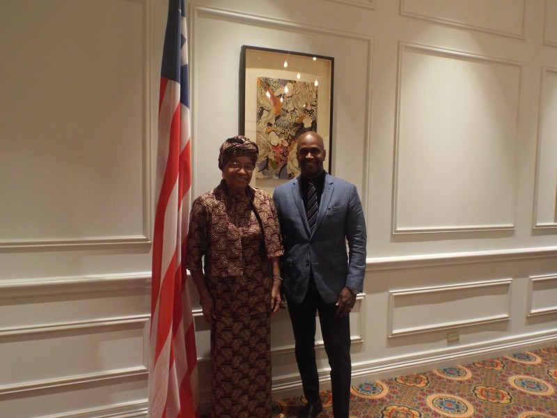 Mr. Derrick Williams, Executive Vice President of TD. Jakes Film and Entertainment, pose for photo with President Sirleaf